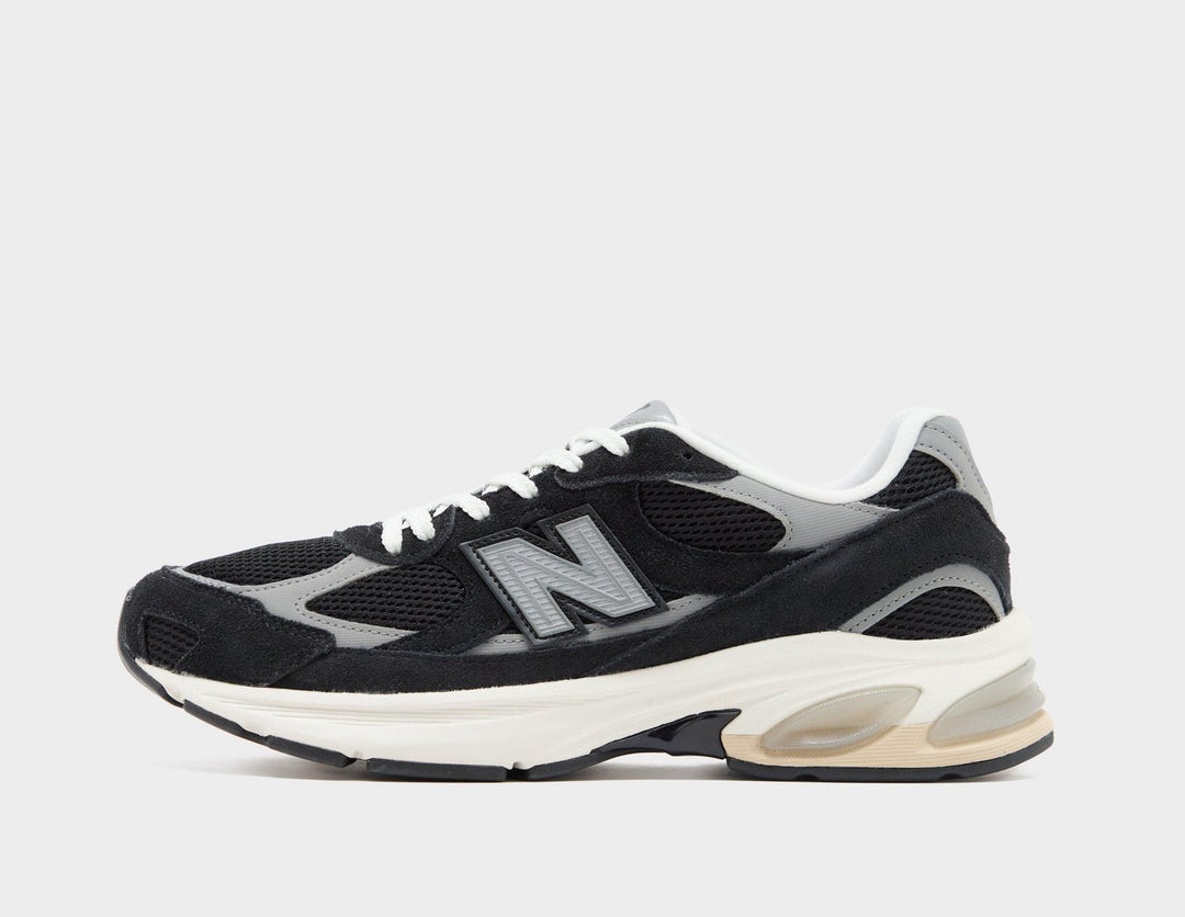 NEW BALANCE 2010 BLACK SILVER CREAM SOLE