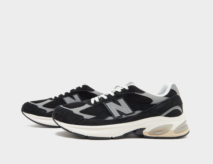 NEW BALANCE 2010 BLACK SILVER CREAM SOLE