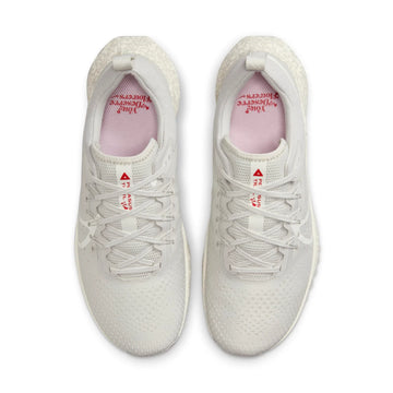 NIKE REACT PEGASUS TRAIL 4 GIVE HER FLOWERS W — Stock