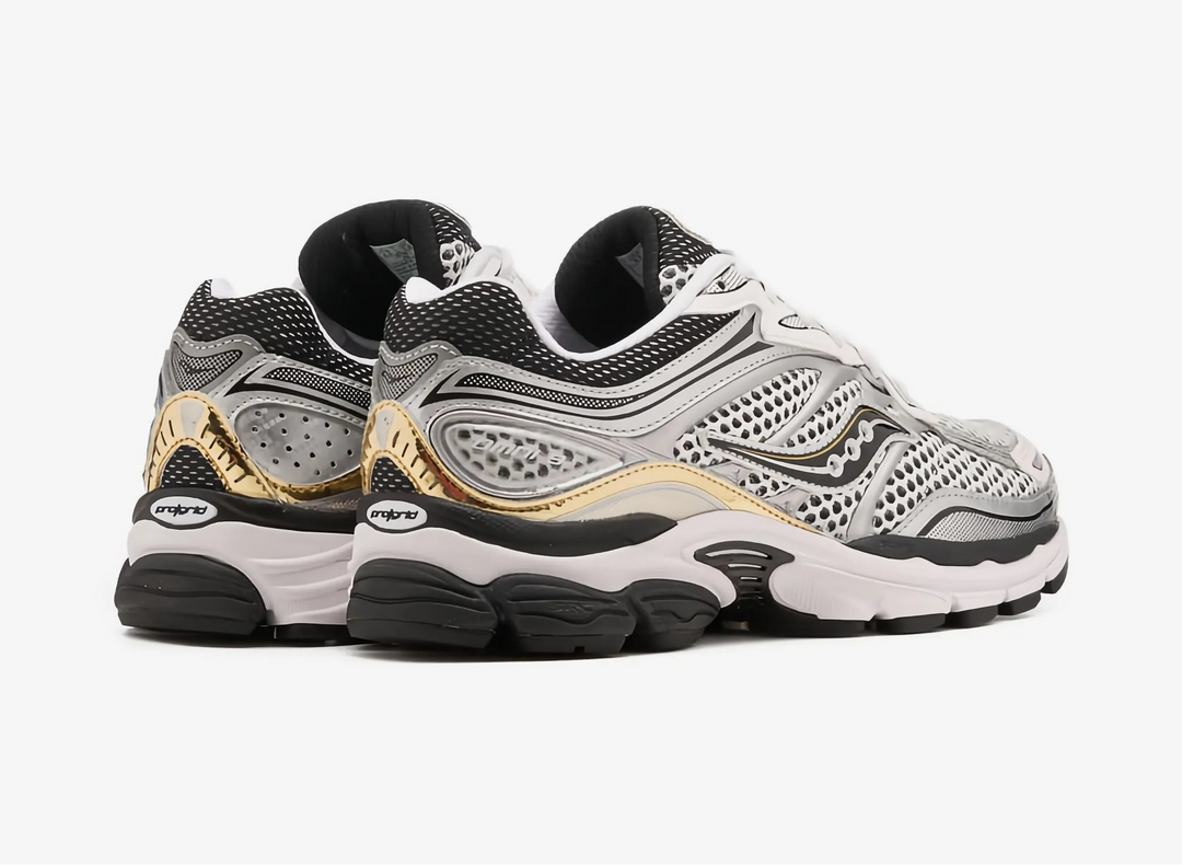 SAUCONY PROGRID OMNI 9 SILVER GOLD