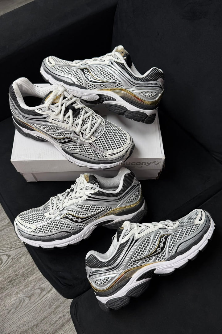 SAUCONY PROGRID OMNI 9 SILVER GOLD