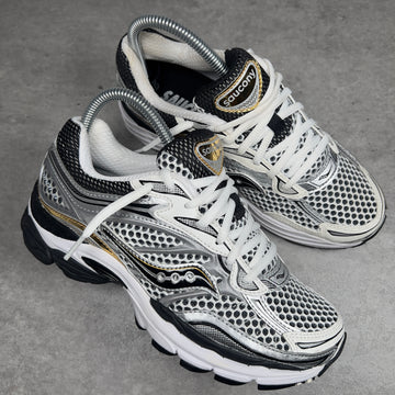 SAUCONY PROGRID OMNI 9 SILVER GOLD