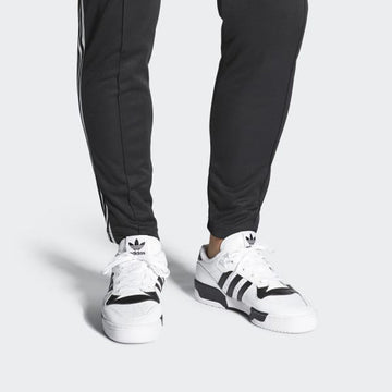 ADIDAS RIVALRY LOW CLOUD WHITE CORE BLACK STRIPES — Stock