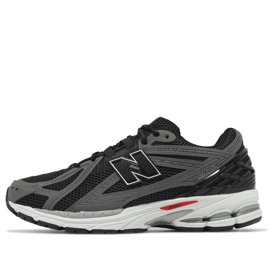 NEW BALANCE 1906R BLACK TEAM RED CASTLEROCK
