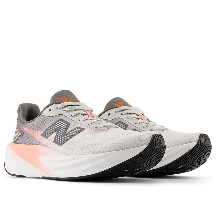NEW BALANCE TCS NYC MARATHON FUELCELL REBEL V5 GRAPEFRUIT GREY MATTER POPPY WOMENS