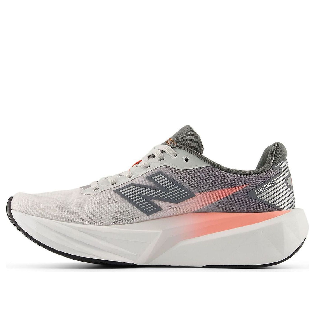 NEW BALANCE TCS NYC MARATHON FUELCELL REBEL V5 GRAPEFRUIT GREY MATTER POPPY WOMENS