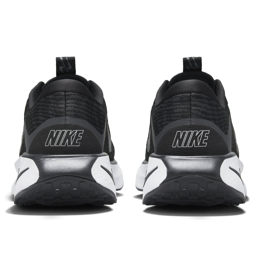 NIKE MOTIVA BLACK WHITE