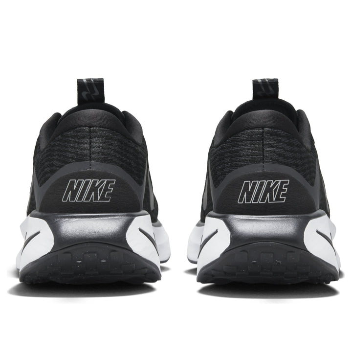NIKE MOTIVA BLACK WHITE